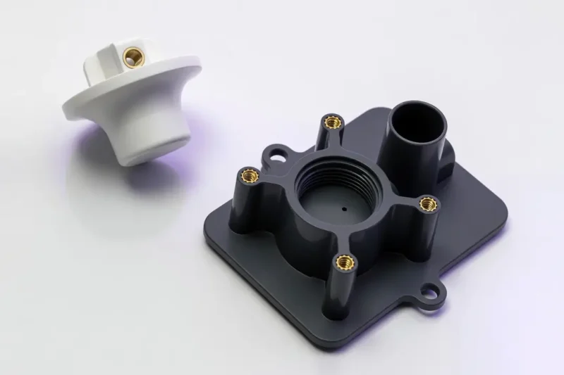 Mit Kunststoff Umspritzte Metalleinleger